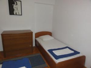 Ein Bett oder Betten in einem Zimmer der Unterkunft Apartmani Anka