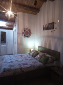 a bedroom with a bed with a light on it at Apartment Ane in Bale