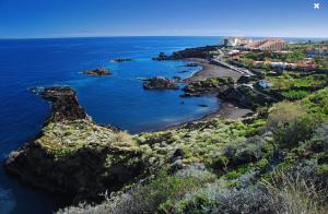 an aerial view of a rocky island in the ocean at Buena Vida in Breña Baja