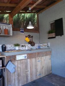 Kuchyň nebo kuchyňský kout v ubytování B&B LoFt 21