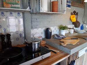 Kuchyň nebo kuchyňský kout v ubytování B&B LoFt 21