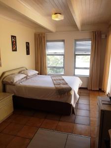 Säng eller sängar i ett rum på Amakaya Backpackers Travellers Accommodation