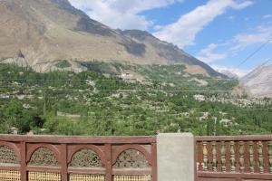 a view of a mountain valley from a bridge at Fort View Guest House in Baltit