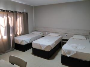 Postel nebo postele na pokoji v ubytování Sleep Hotel
