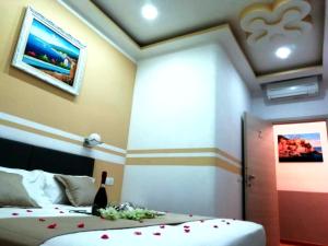 A bed or beds in a room at Affittacamere ELVI
