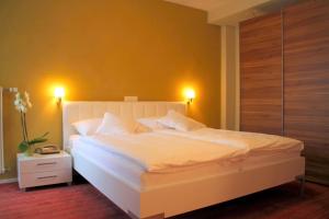 Ліжко або ліжка в номері Hotel Berghof Amaranth