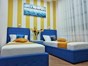 A bed or beds in a room at Affittacamere ELVI