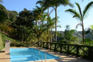 A piscina localizada em Pousada Recanto Primata ou nos arredores