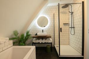 Een badkamer bij Poort Beach Boutique Apartments