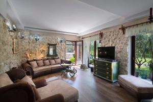 TV a/nebo společenská místnost v ubytování Palazzo Banicevic Luxury Rooms