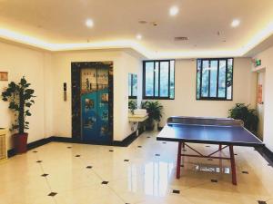 Table tennis facilities sa 7Days Inn Changyang Qingjiang Yichang Gallery o sa malapit