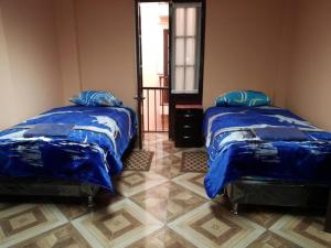 Ένα ή περισσότερα κρεβάτια σε δωμάτιο στο No Fear Adventure Hostel