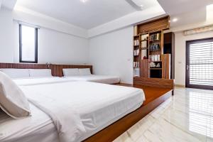 Postel nebo postele na pokoji v ubytování Starry Home