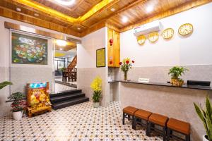 TV a/nebo společenská místnost v ubytování The Lit Villa Hoi An