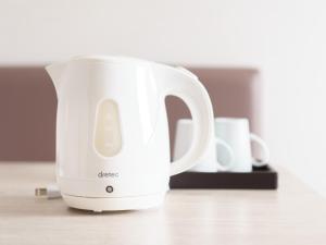 Příslušenství pro přípravu čaje a kávy v ubytování Super Hotel Saitama Kawagoe