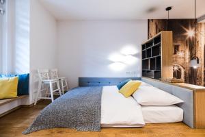 Postel nebo postele na pokoji v ubytování Native Apartments Starowiślna 54