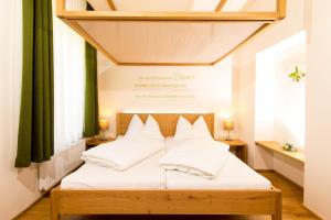 
Ein Bett oder Betten in einem Zimmer der Unterkunft Himmlisch Urlauben Söchau

