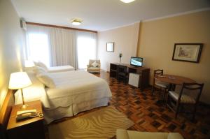 Cama o camas de una habitación en Hotel Los Cedros
