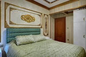 Voodi või voodid majutusasutuse Emirganlı Ottoman House toas