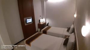 TV a/nebo společenská místnost v ubytování Xtra Hotel Bengkulu