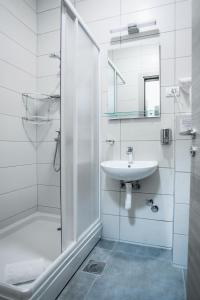 Koupelna v ubytování Sajam Garni hotel