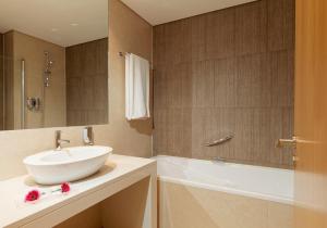 Ein Badezimmer in der Unterkunft Mercure Lisboa Almada