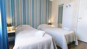 Cama o camas de una habitación en Premium Hostel