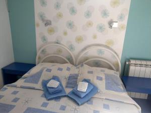 Postel nebo postele na pokoji v ubytování Apartment Harmonija apatin