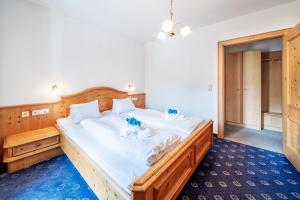 Posteľ alebo postele v izbe v ubytovaní Ferienhaus Sonnrain
