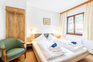 Posteľ alebo postele v izbe v ubytovaní Ferienhaus Sonnrain
