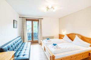 Posteľ alebo postele v izbe v ubytovaní Ferienhaus Sonnrain