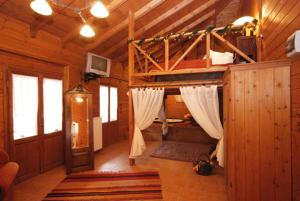 Postel nebo postele na pokoji v ubytování Guesthouse Alonistaina