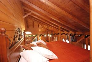 Ένα ή περισσότερα κρεβάτια σε δωμάτιο στο Ξενώνας Αλωνίσταινα