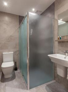 Kylpyhuone majoituspaikassa Hostal María Luisa