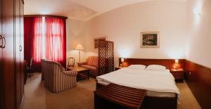 Postel nebo postele na pokoji v ubytování Hotel Central