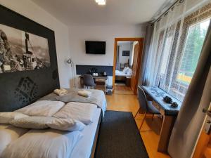 Postel nebo postele na pokoji v ubytování Pokoje Gościnne KAMI