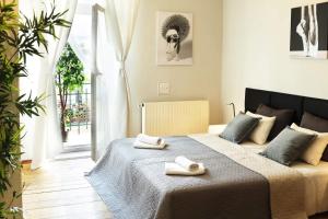 Lova arba lovos apgyvendinimo įstaigoje Florianska Gate Luxury Apartments