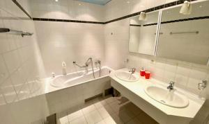 Koupelna v ubytování Hotel Rustikal