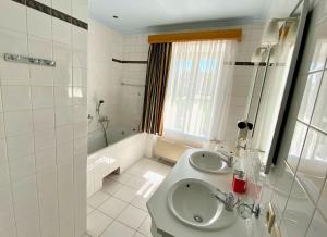 Koupelna v ubytování Hotel Rustikal + 37 fotografií