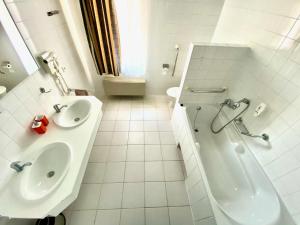 Koupelna v ubytování Hotel Rustikal