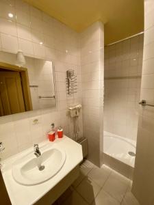 Koupelna v ubytování Hotel Rustikal