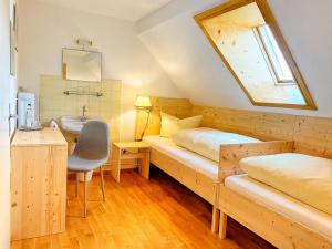 
Ein Bett oder Betten in einem Zimmer der Unterkunft Gasthof Graf

