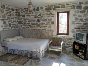 Postel nebo postele na pokoji v ubytování '' I FOLIA '' / ' 'LE NID ''