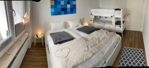 Giường trong phòng chung tại Ferienwohnung Erholung in Altastenberg