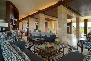 a living room with couches and a coffee table at Radisson Collection Hotel Bamako in Bamako