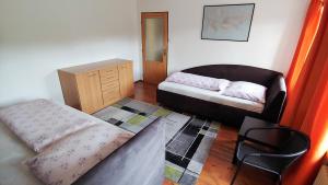 Katil atau katil-katil dalam bilik di Apartmán Adam