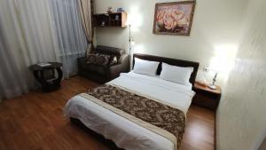 Posteľ alebo postele v izbe v ubytovaní One bedroom 3,4 Mala Zhytomyrska