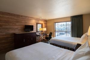 Letto o letti in una camera di Riverside Inn