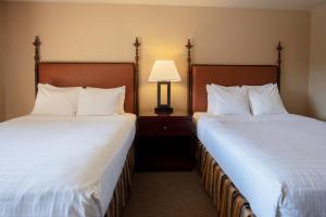 Letto o letti in una camera di Riverside Inn