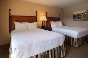 Letto o letti in una camera di Riverside Inn